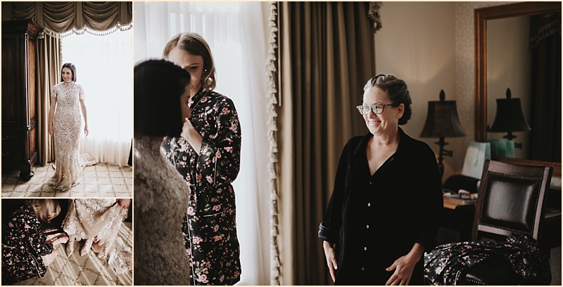 Bride putting on dress